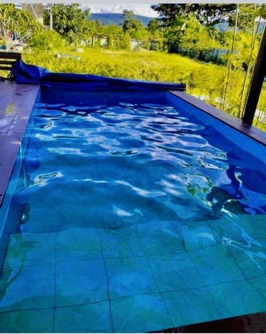 ขายบ้านสวนพร้อมที่ดินอำเภอเมือง จังหวัดสกลนครขนาด 1 ไร่ 1 งาน วิวหลักล้าน มองเห็นผาเด่น ผาหินแดง